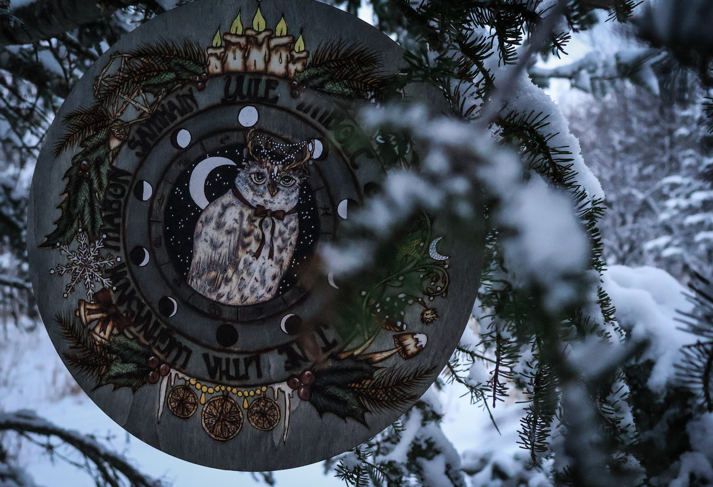 Woodburned wheel of the year for yule witchmas for the pagan season with snowy owl and moon phases, astrological symbols for pagan and witches and wiccans by www.smokecrafthollow.com