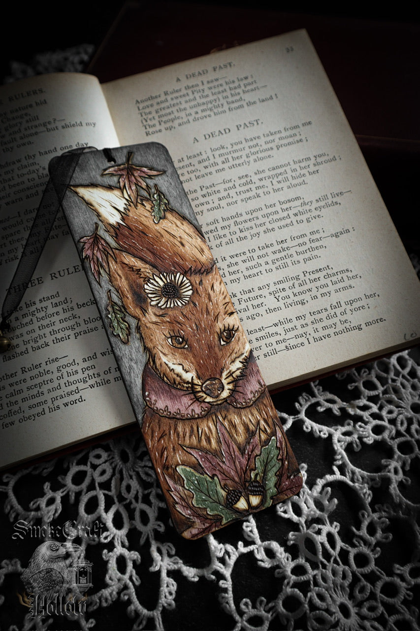 Woodburned autumn woodland fox bookmark with leaves, acorns, and a daisy handcrafted in Suffolk, England by Smokecraft Hollow