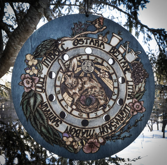 Woodburned Ostara Wheel of the year for witches celebration of the pagan sabbath or the spring equinox with flower, hare, eggs by www.smokecrafthollow.com