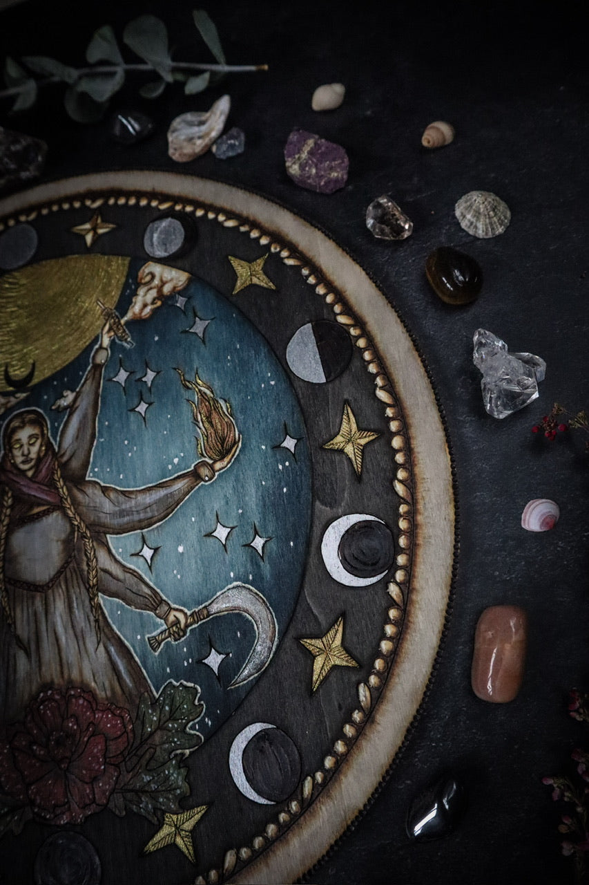 Woodburned wall plaque art decor of Slavic Goddess Mara Marzanna with poppy and oak leaves, nautical stars, and moon phases by www.smokecrafthollow.com