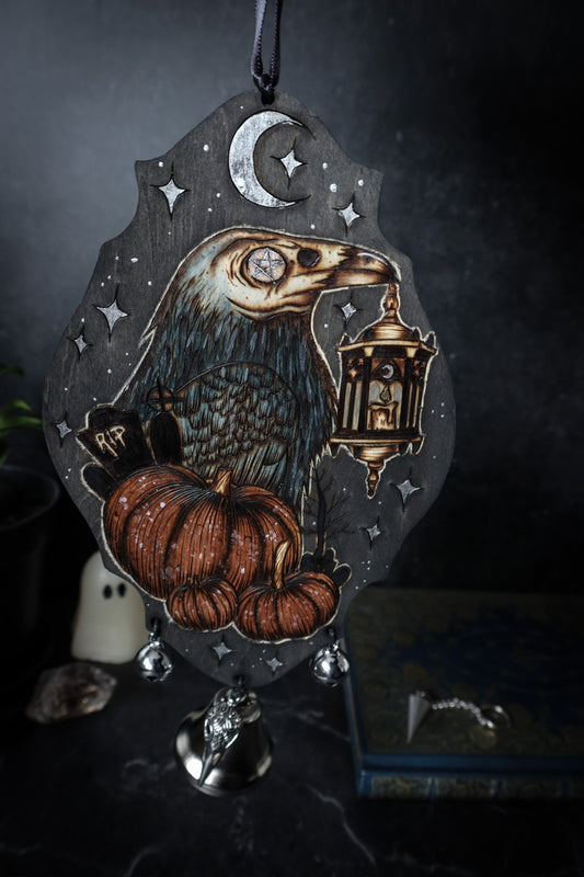 Woodburned spooky raven and pumpkins witch bells by www.smokecrafthollow.com