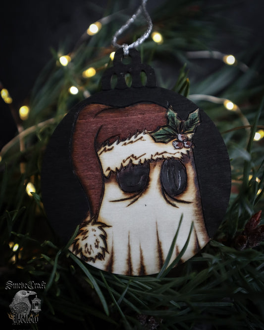 Adorn your spookmas tree with this adorable Santa hat spooky Christmas ghost woodburned bauble ornament &nbsp;measuring 7cm with sparkly silver hanging twine. This ghost is ready to haunt your tree and scare off any would-be gift thieves! By www.smokecrafthollow.com