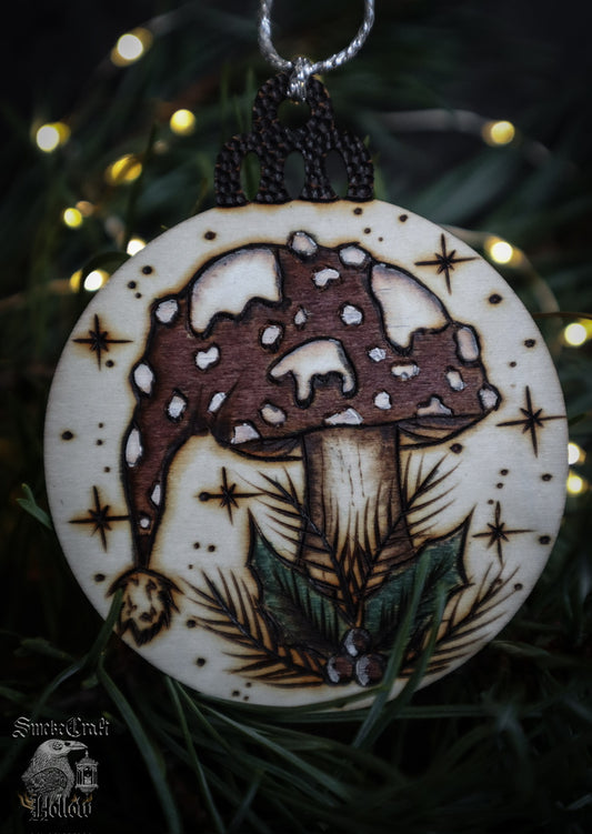 Experience the magic of the season with this Snowy Christmas Toadstool Ornament Bauble for mushroom fungi lovers everywhere. Crafted. This festive ornament is a mushy addition to any Christmas tree measuring 7cm with silver twine.