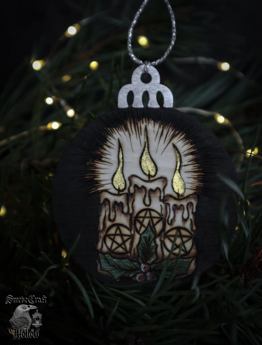 dd the magick to your witchmas tree with this pentagram candle ornament with sparkly gold accents, measuring 7cm with silver twine for hanging on your magickal Yule tree this winter solstice season!&nbsp;

Pyrography art handcrafted in Suffolk, U.K.&nbsp;