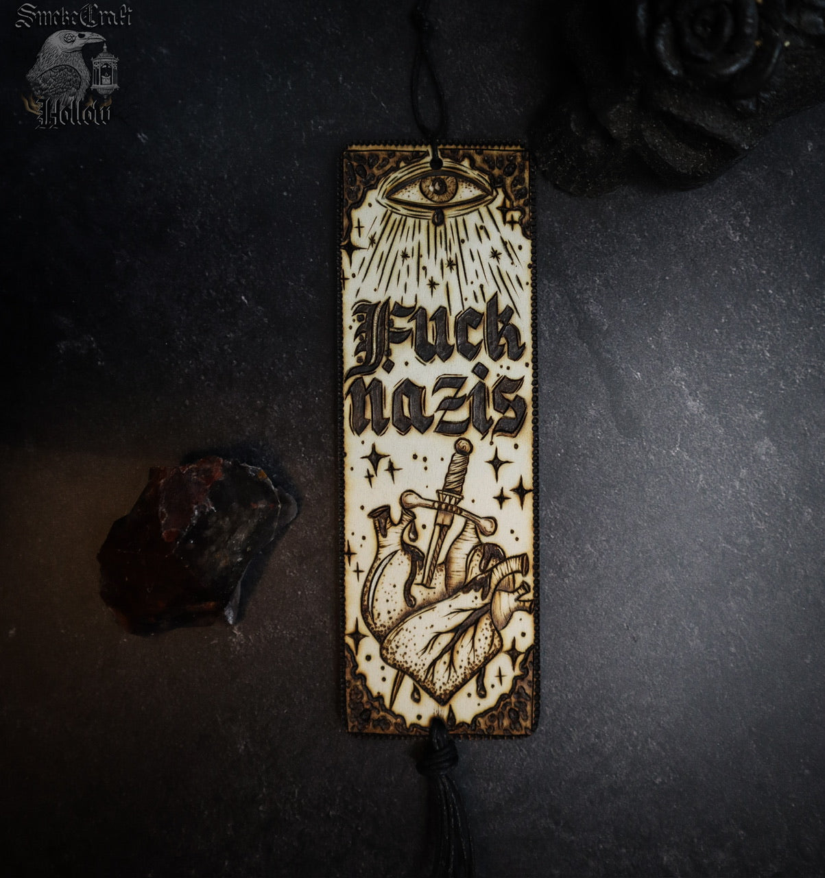 Fuck nazis woodburned wall banner artwork decor for ant—racist anti-facist activist decor by smokecraft hollow with all seeing eye and anatomical heart in medieval gothic style