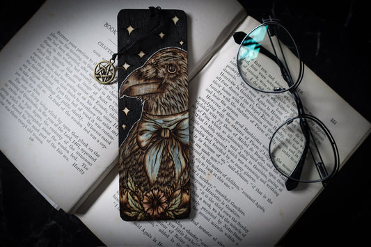 Raven Bookmark for Witchy familiar gifts for pagans and bookworms and bibliophiles this hand woodburned bookmark by www.smokecrafthollow.com will make the perfect witchmas gift for any reader. 